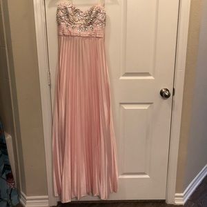 Strapless baby pink prom dress with gemstones